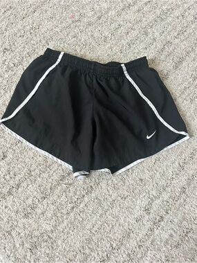 Nikes Girls Dri Fit Athletic Shirts. Lightly used Size Medium
